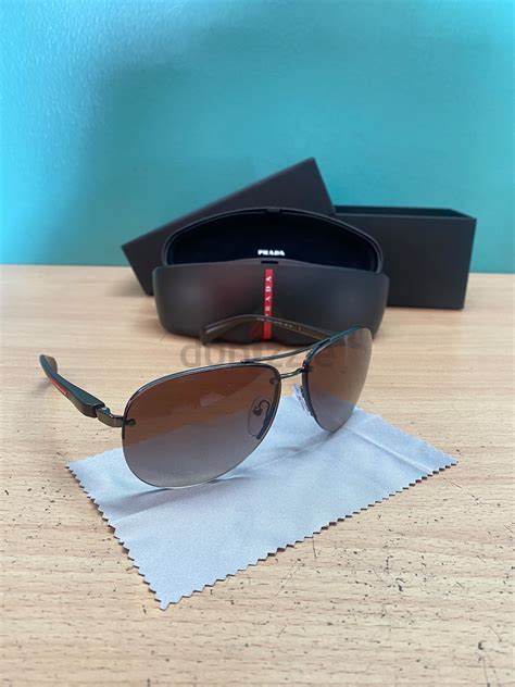 prada sunglasses tan|prada unisex sunglasses.